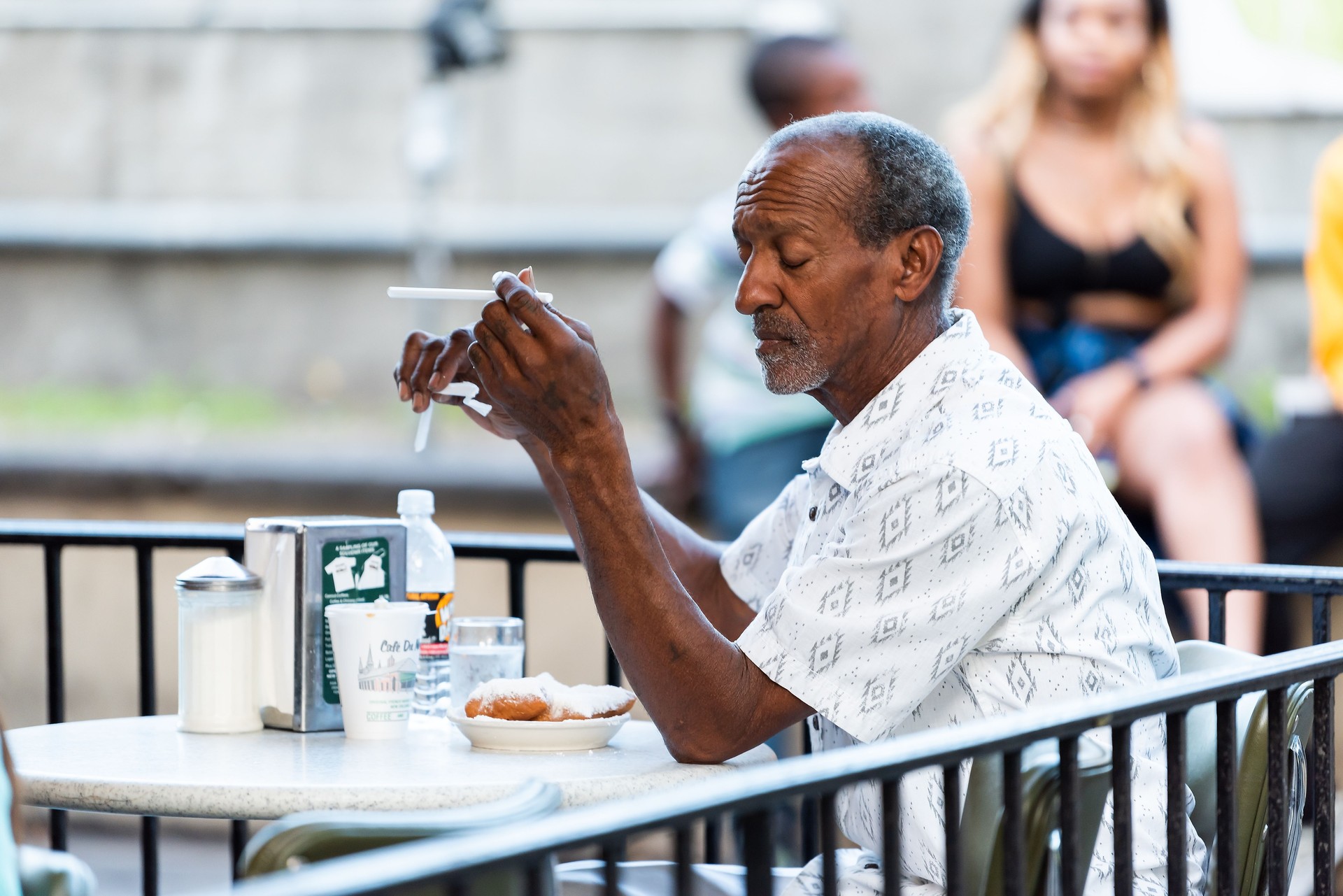 Resident sitting eating at his favorite restaurant